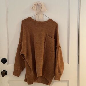 Tan women’s sweater with pocket size S/M